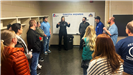 Amanda Yellow talks to Citizen Academy attendees in one of the Bismarck Event Center locker rooms. 